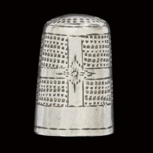 An English silver thimble , NORWICH MAKERS MARK D. WITHIN AN