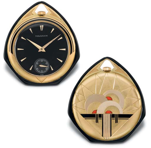 Marvin. A fine and decorative 18K gold and enamel asymmetrical o