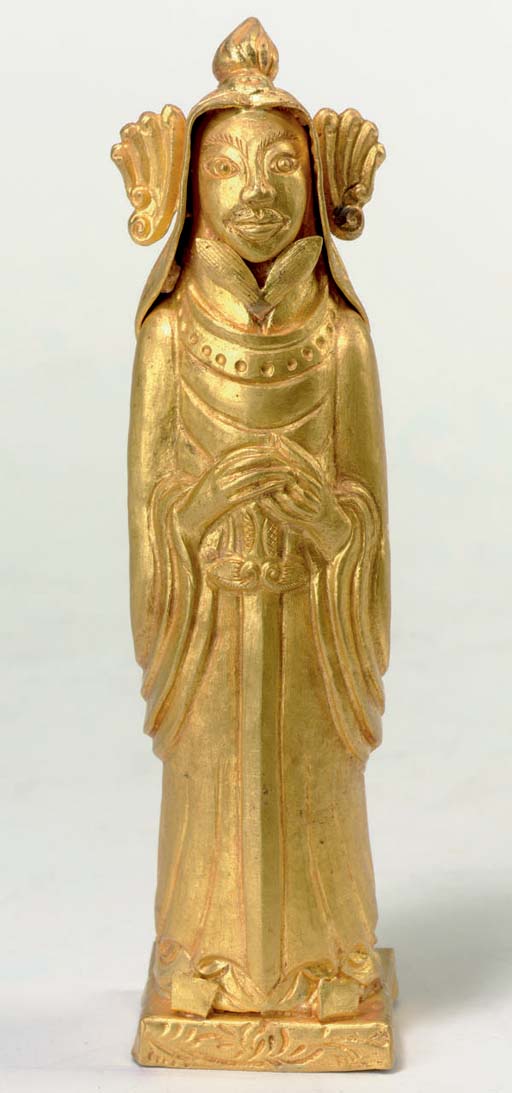 A CHINESE GILT AND LACQUERED WOOD FIGURE OF A CAPARISONED