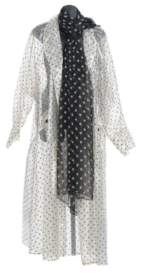 A BLACK AND WHITE POLKA DOT RAINCOAT, Christie's