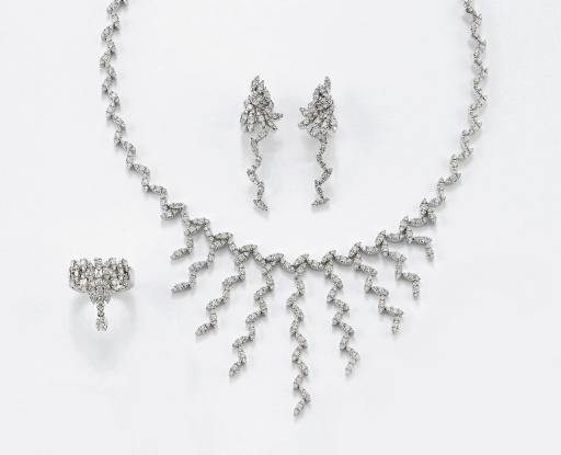 PARURE IN ORO BIANCO E BRILLANTI, FIRMATA PASQUALE BRUNI