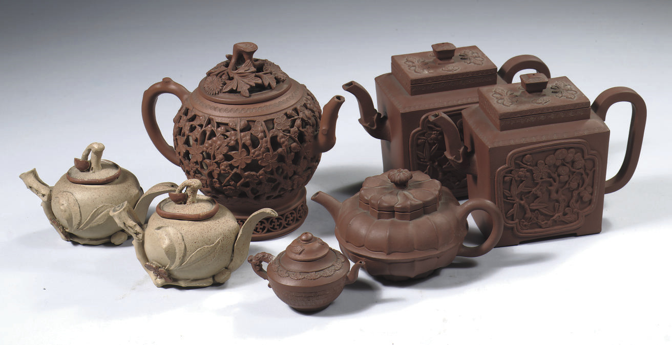 An assorted lot of seven Yixing teapots and covers , 18/19TH CENTURY