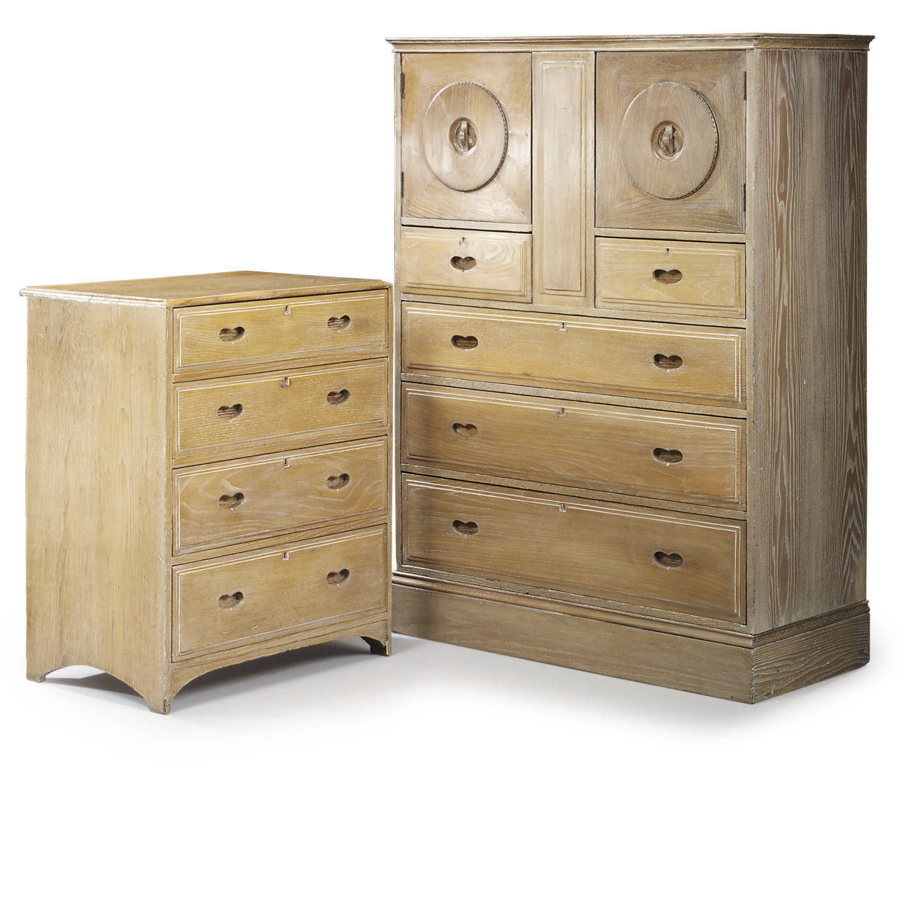 A HEAL'S LIMED OAK BEDROOM SUITE , DESIGNED BY AMBROSE HEAL, CIRCA 1912