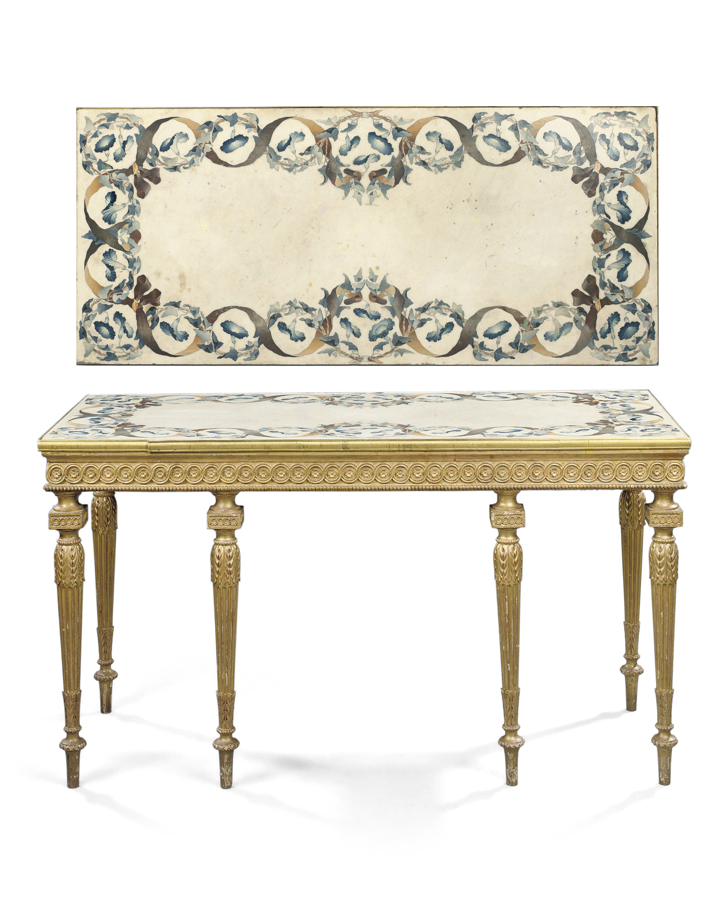 A George III giltwood and scagliola side table, attributed to Mayhew and Ince, the top attributed to Dominic Bartoli, circa 1770. 32½ in (82.5 cm) high; 58¾ in (149 cm) wide; 26 in (66 cm) deep. Sold for £73,250 on 5 June 2008 at Christie’s in London