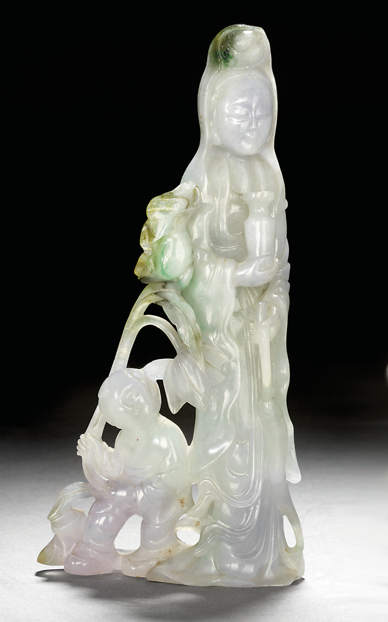 A JADEITE CARVING OF GUANYIN , 19TH CENTURY Christie's