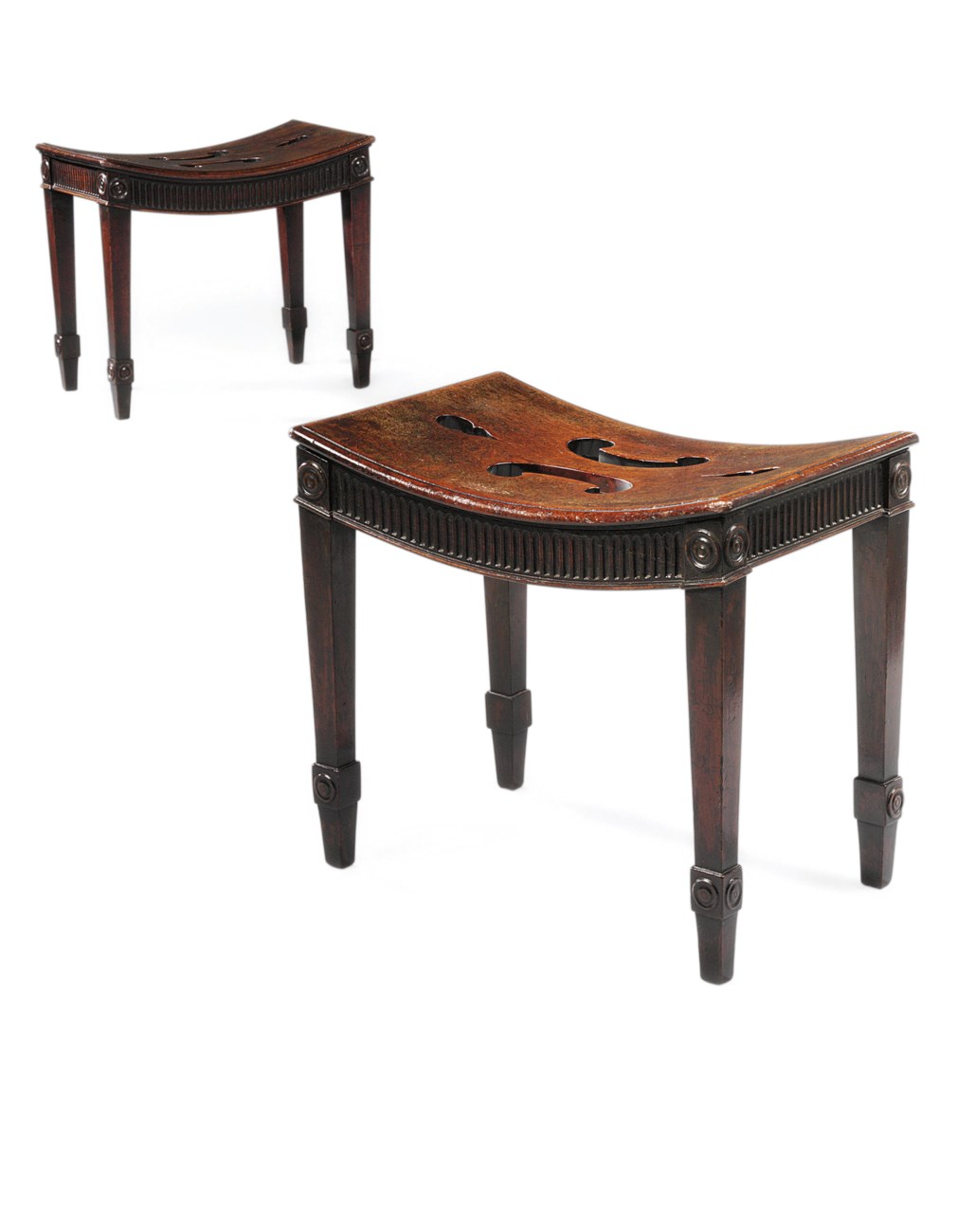 A PAIR OF III MAHOGANY HALL STOOLS , IN THE MANNER OF JOHN