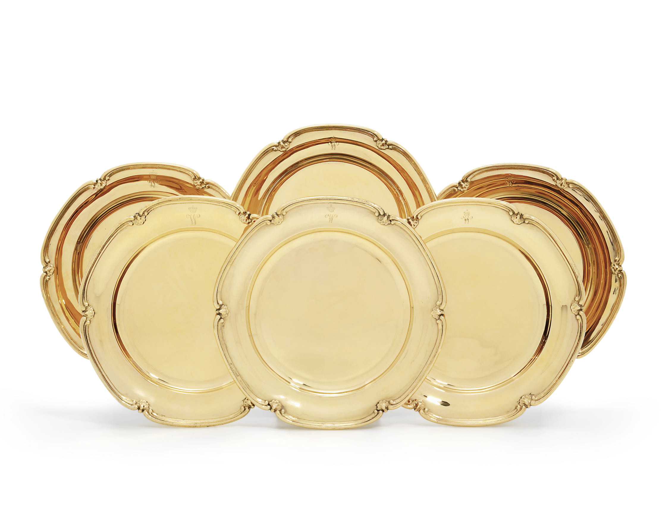 A SET OF SIX GERMAN SILVERGILT DINNERPLATES , STAMPED 'HERMANN', LATE