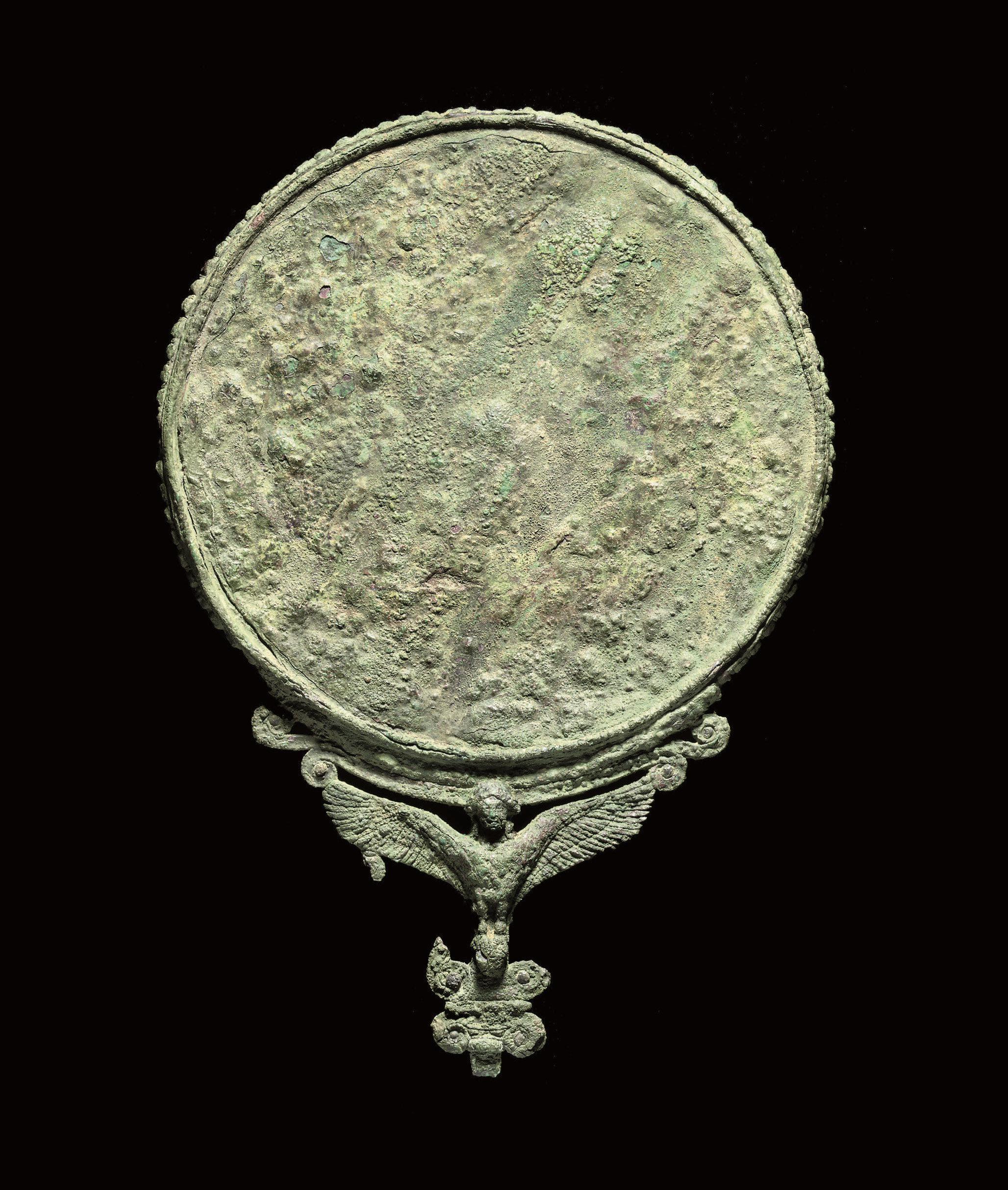 A GREEK BRONZE MIRROR , 5TH CENTURY B.C. Christie's