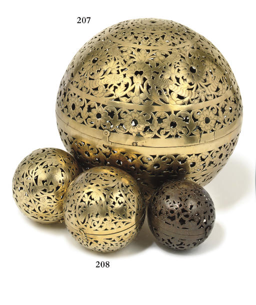 A LARGE PIERCED BRASS INCENSE BALL , PROBABLY DUTCH EAST INDIES, CIRCA