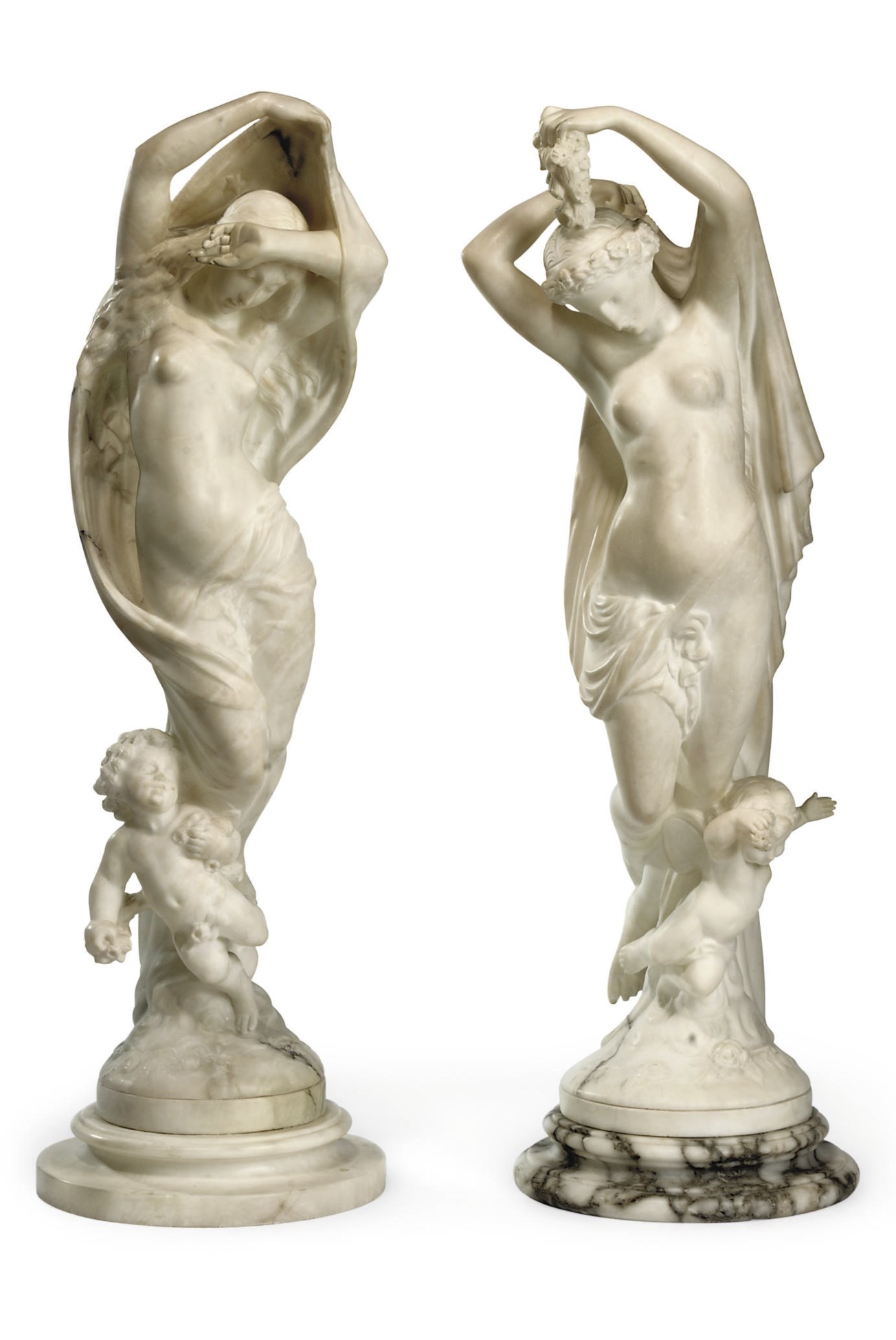 A PAIR OF ITALIAN ALABASTER FIGURES OF MAIDENS , CIRCA 1900 Christie's