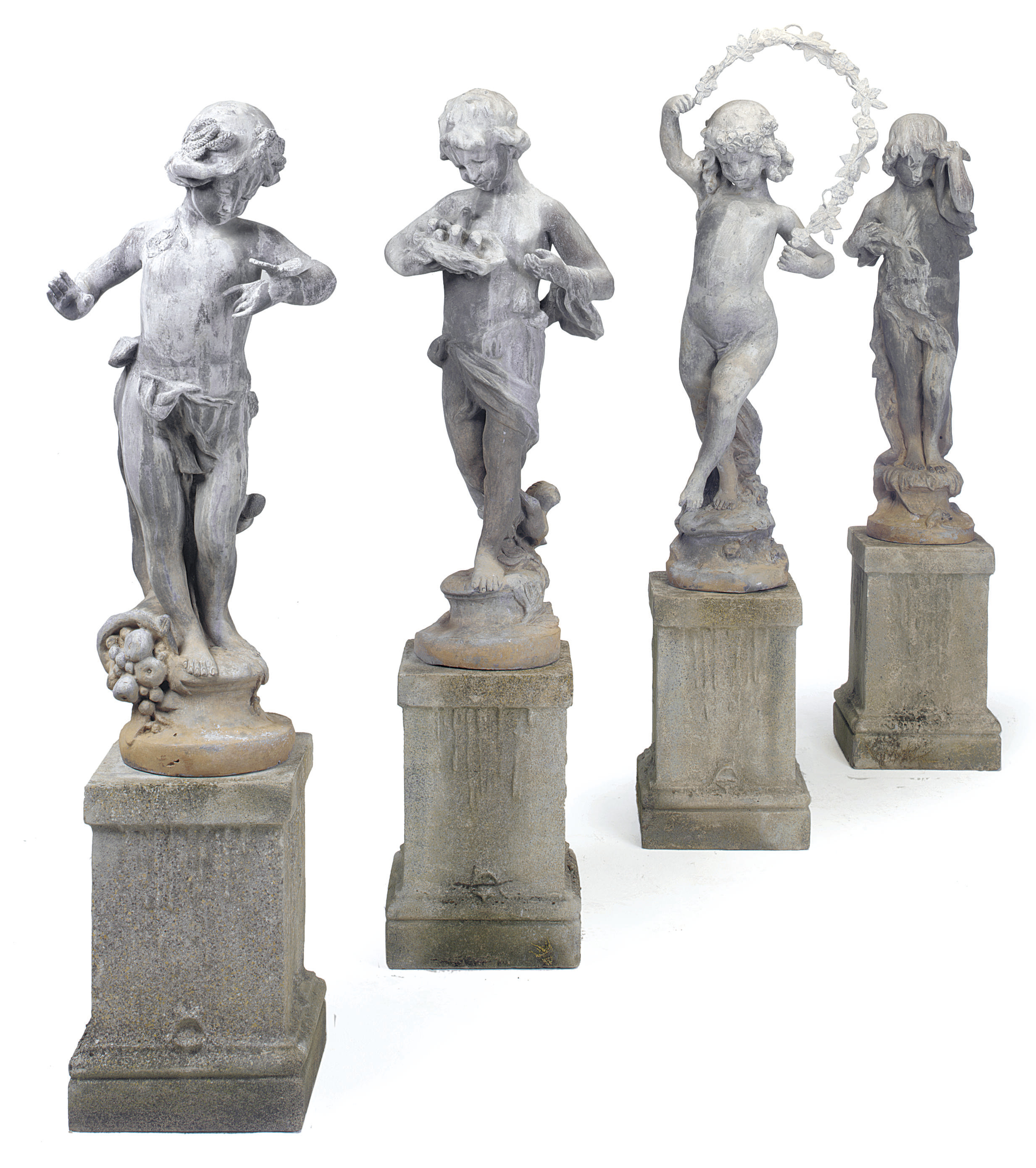 A SET OF FOUR LEAD FIGURES REPRESENTING THE SEASONS , MID 20TH CENTURY