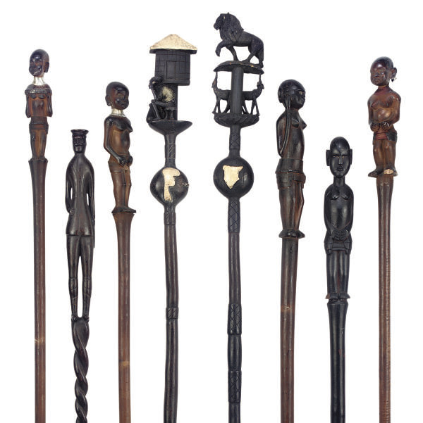 A COLLECTION OF KENYAN AND AFRICAN WOOD STAFFS AND WALKING STICKS