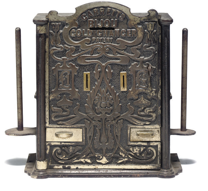 A LATE VICTORIAN IRON MONEY CHANGER