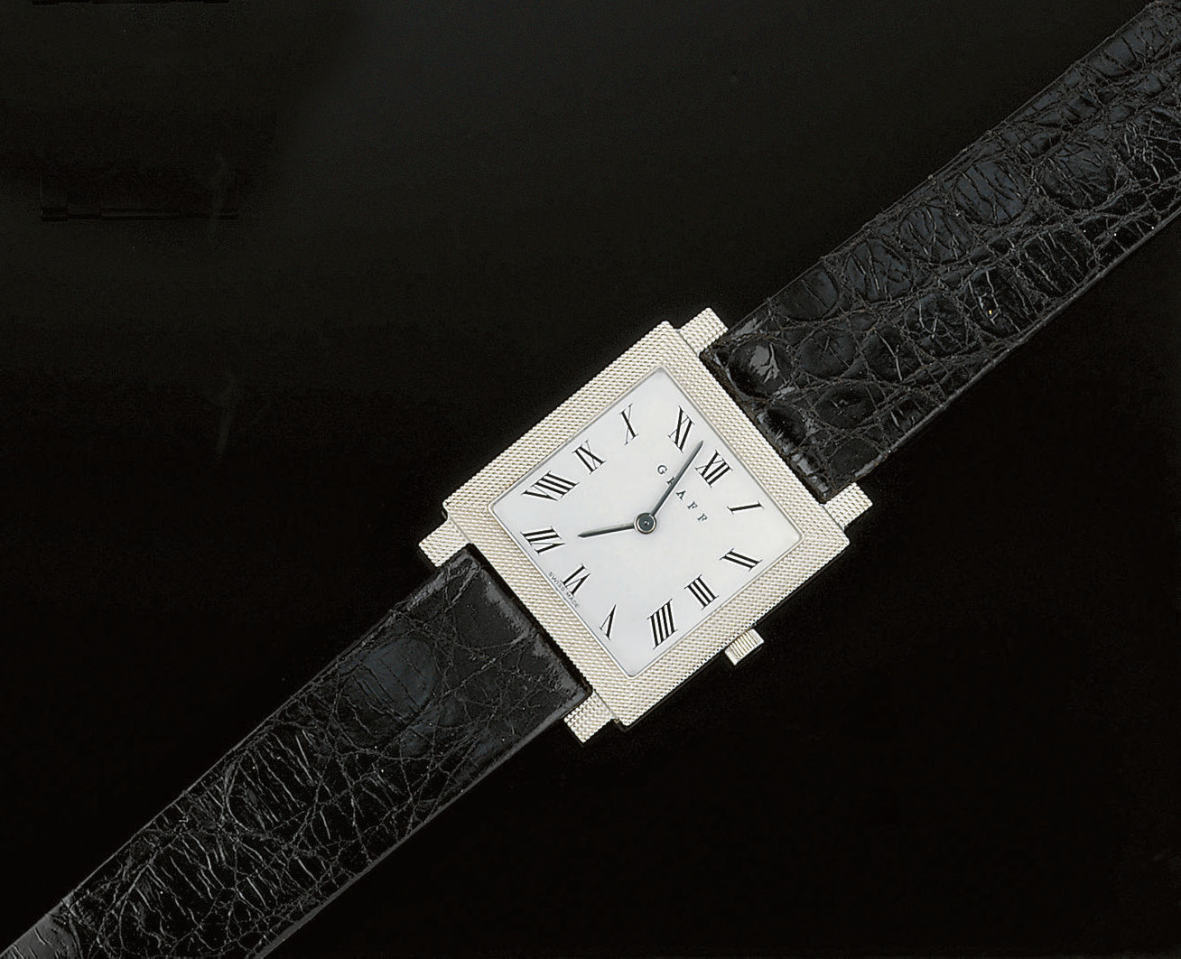 AN 18CT. GOLD QUARTZ CHRONOGRAPH WRISTWATCH, BY CHOPARD