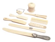 A COLLECTION OF IVORY UTENSILS , LATE 19TH AND EARLY 20TH CENTURY