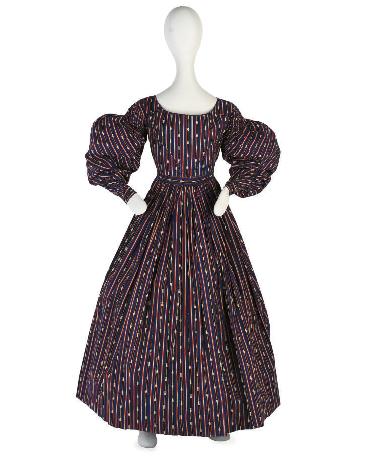A DAY DRESS OF VIVID BLUE PRINTED COTTON LATE 1830S Christie's