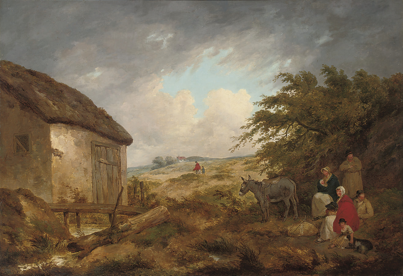 A wooded landscape with travellers at rest on a track, by a cottage 
