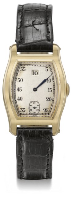 Meylan. An unusual 18K gold tonneau-shaped jump hour wristwatch ...