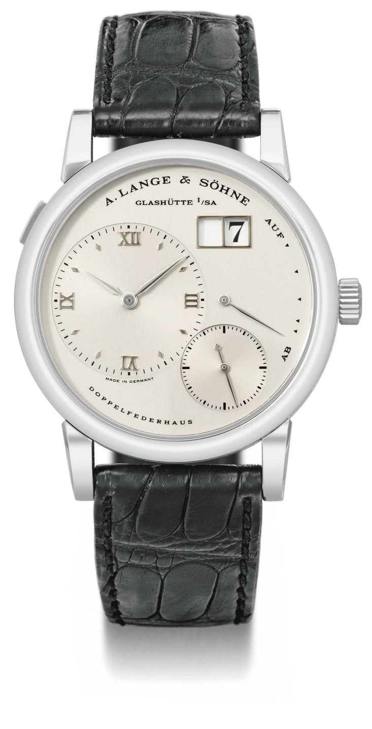 A. Lange & Söhne. A fine platinum twin barrel wristwatch with oversized date and power reserve