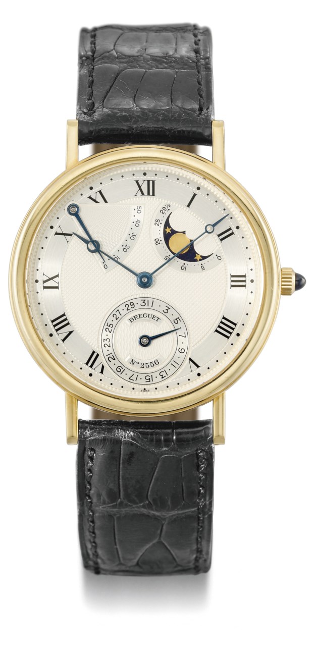 Breguet. An 18K gold automatic wristwatch with date, power reserve and