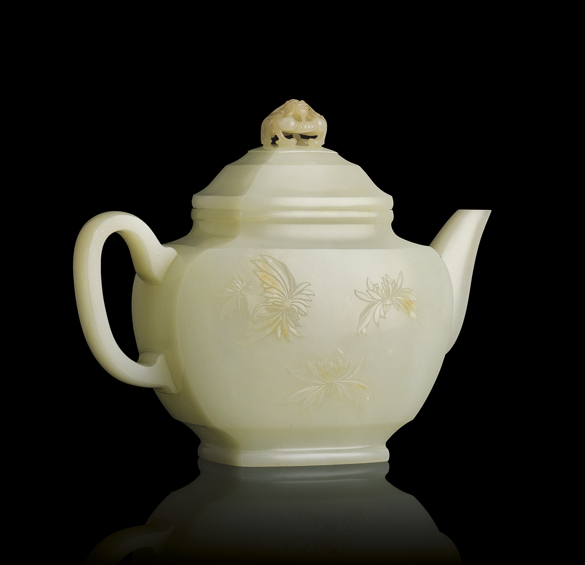 AN EXQUISITE WHITE JADE TEAPOT AND COVER Christie's