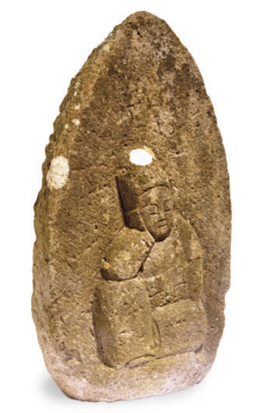 THREE JAPANESE CARVED STONE GARDEN FIGURES OF GUARDIANS AND A BRONZE