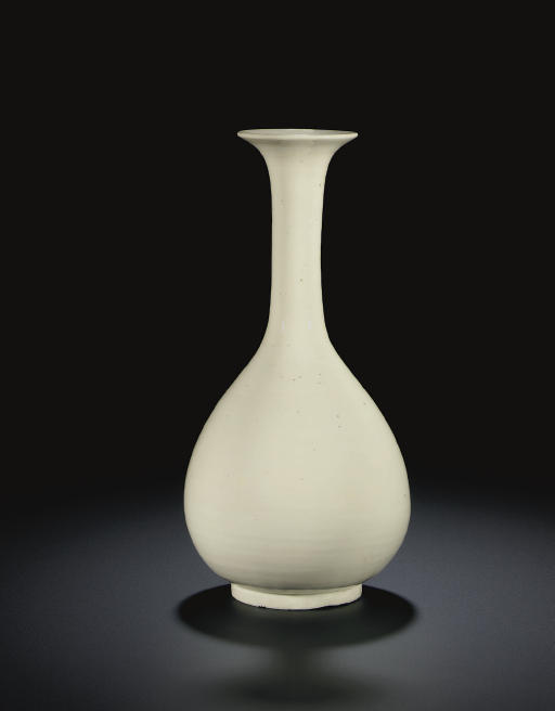 A RARE WHITEGLAZED STONEWARE BOTTLE VASE