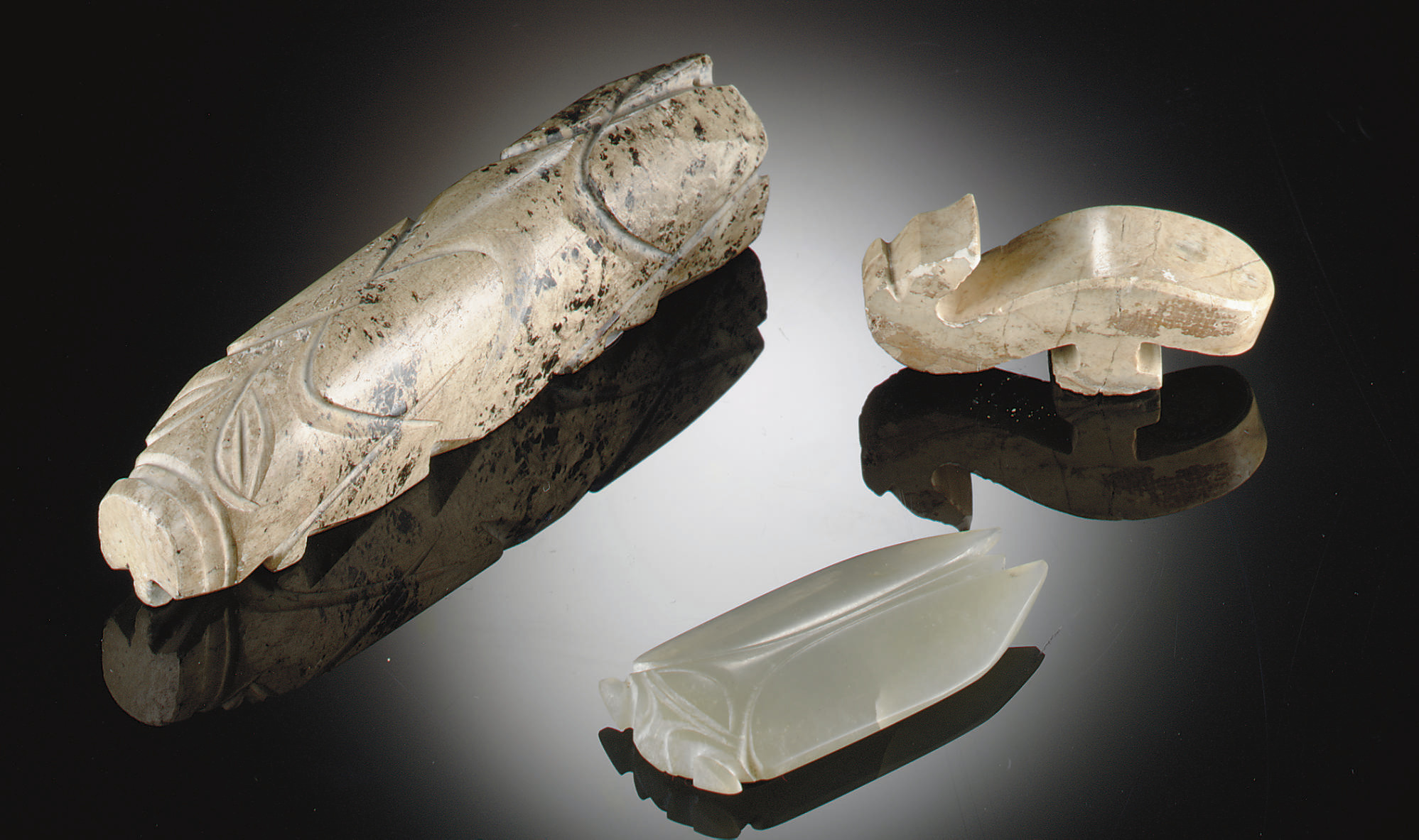 THREE EARLY JADE CARVINGS , HAN DYNASTY (206 BCAD 220) Christie's