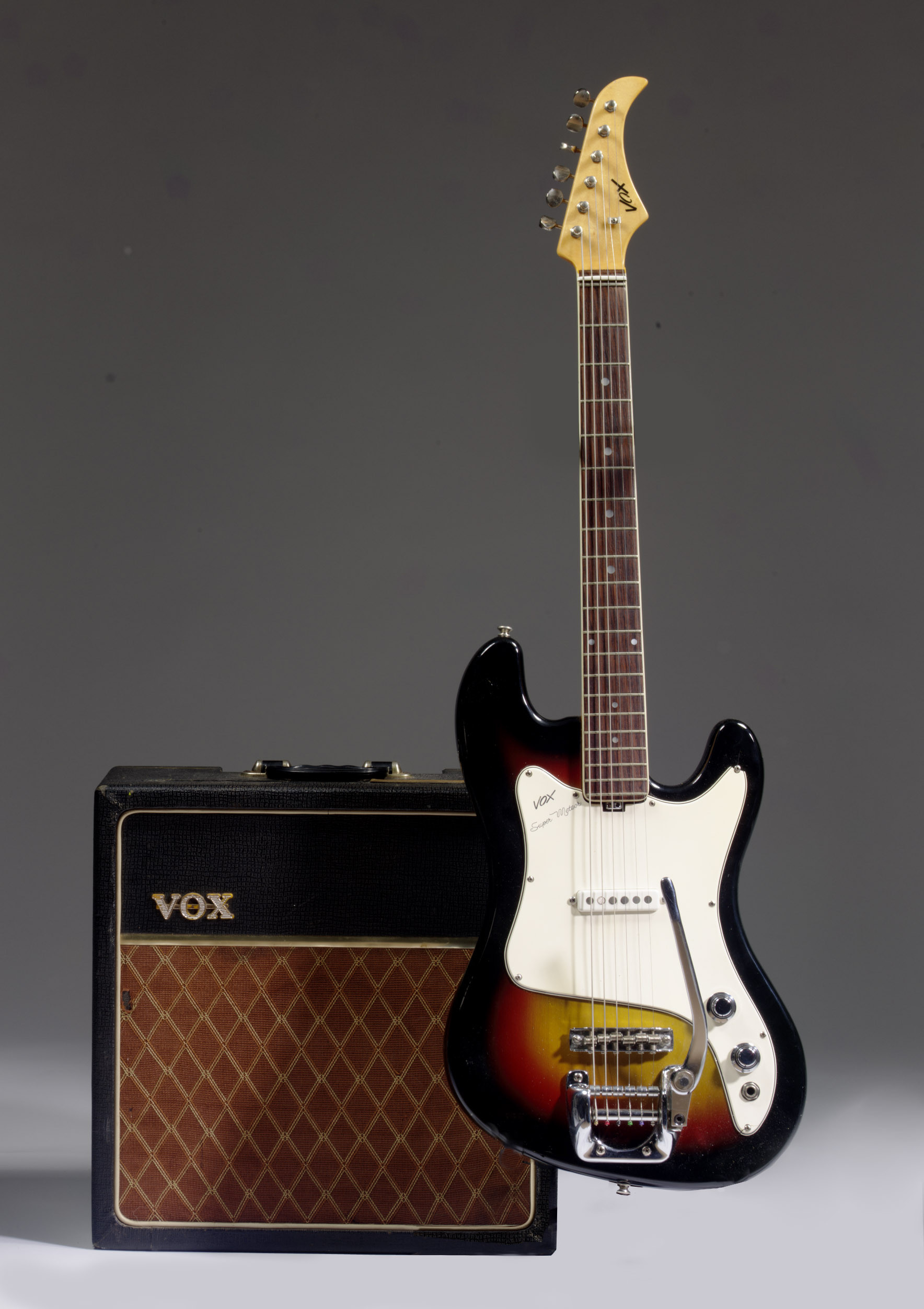 VOX , A SOLID-BODY ELECTRIC GUITAR, SUPER METEOR, AND AN AMPLIFIER ...