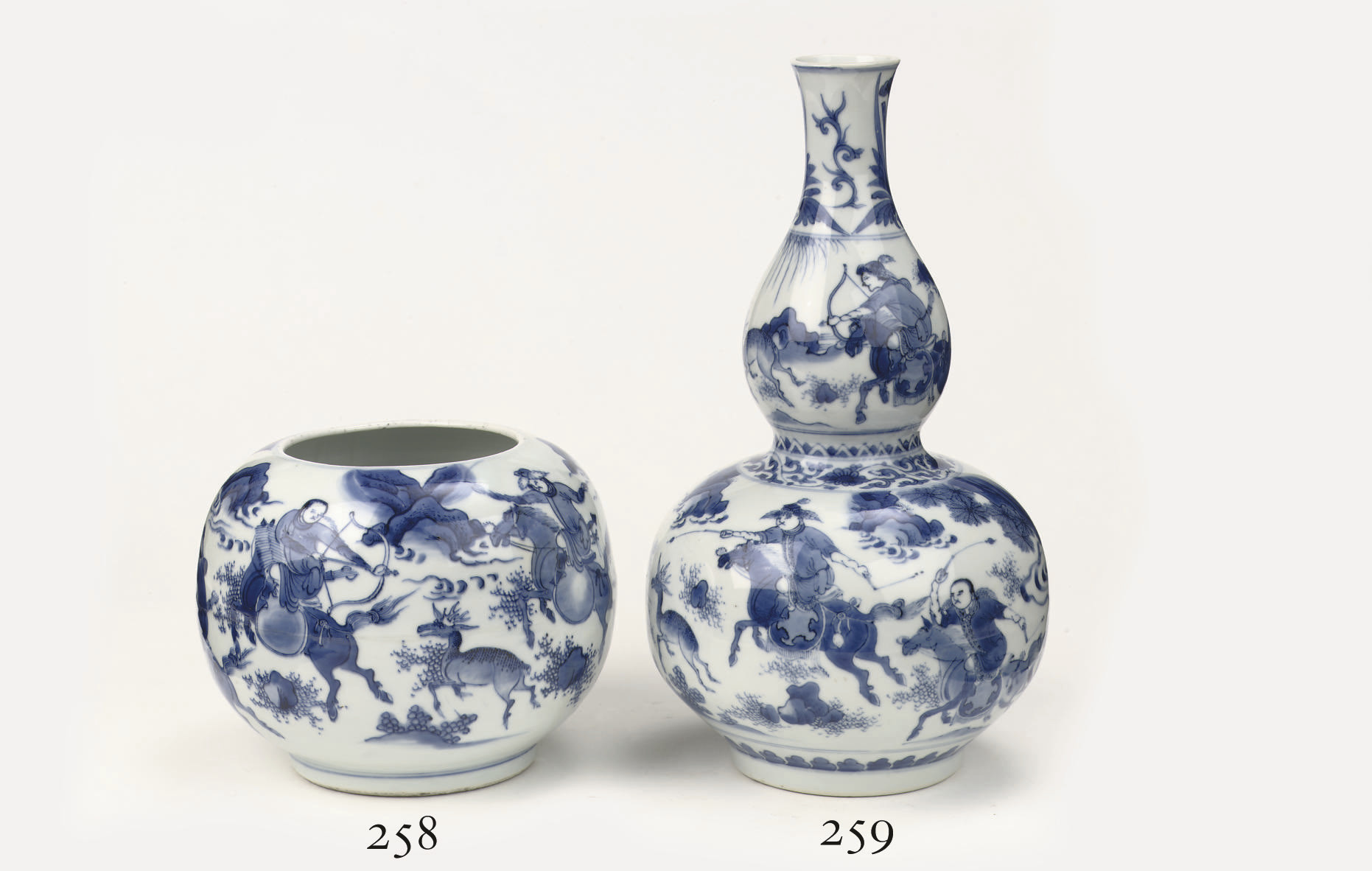 A Chinese Transitional blue and white double gourd vase