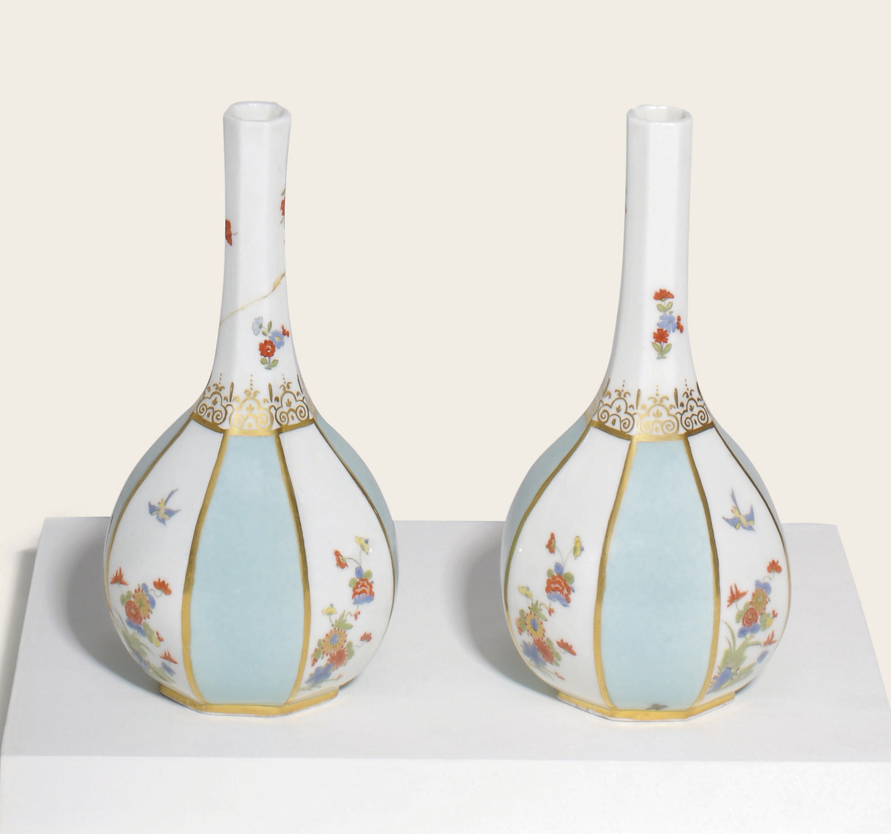 A PAIR OF MEISSEN PORCELAIN ROYAL SELADON-GROUND OCTAGONAL BOTTLE 