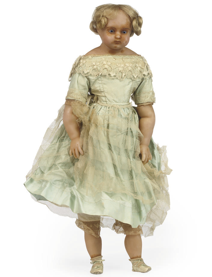 AN EARLY VICTORIAN POURED WAX DOLL , CIRCA 1840 Christie's