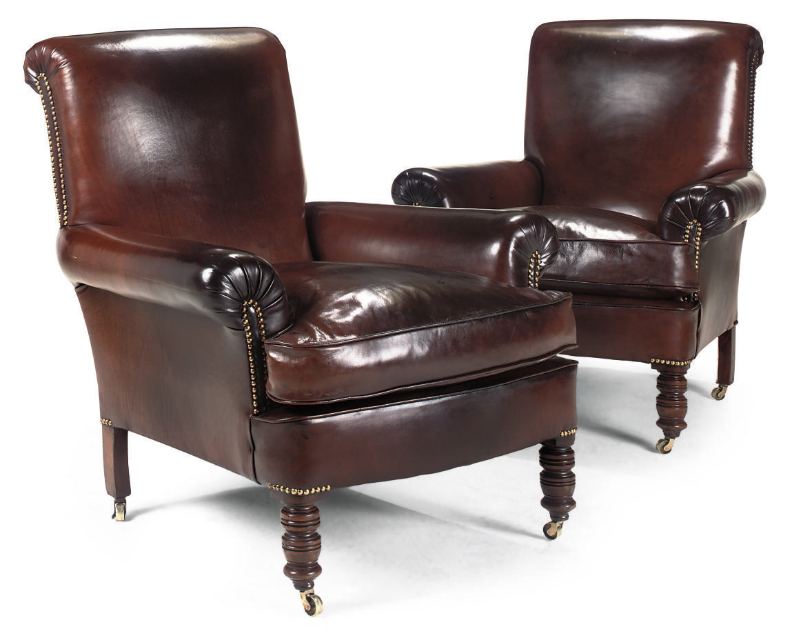 A PAIR OF LATE VICTORIAN LEATHER UPHOLSTERED CLUB ARMCHAIRS , LATE 19TH