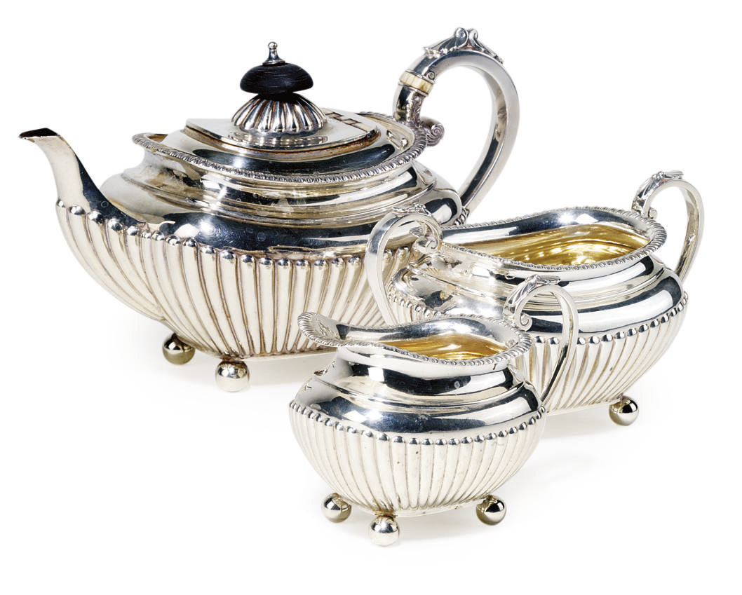 A LATE VICTORIAN SILVER THREEPIECE BACHELOR'S TEA SET , MARK OF JAMES DEAKIN AND SON, SHEFFIELD