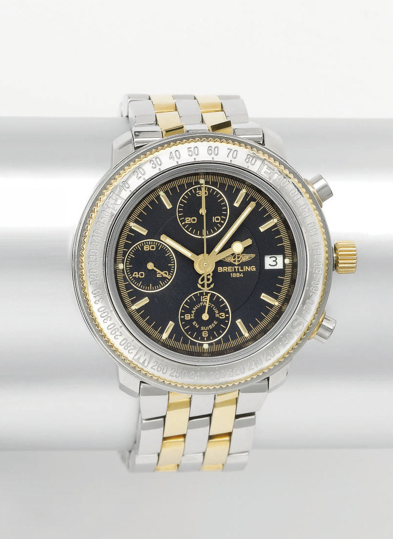 Breitling. A stainless steel and gold automatic dual time chronograph