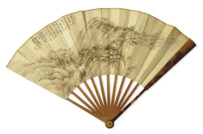A CHINESE FAN PAINTING OF A MOUNTAIN LANDSCAPE WITH A CARVED BAMBOO