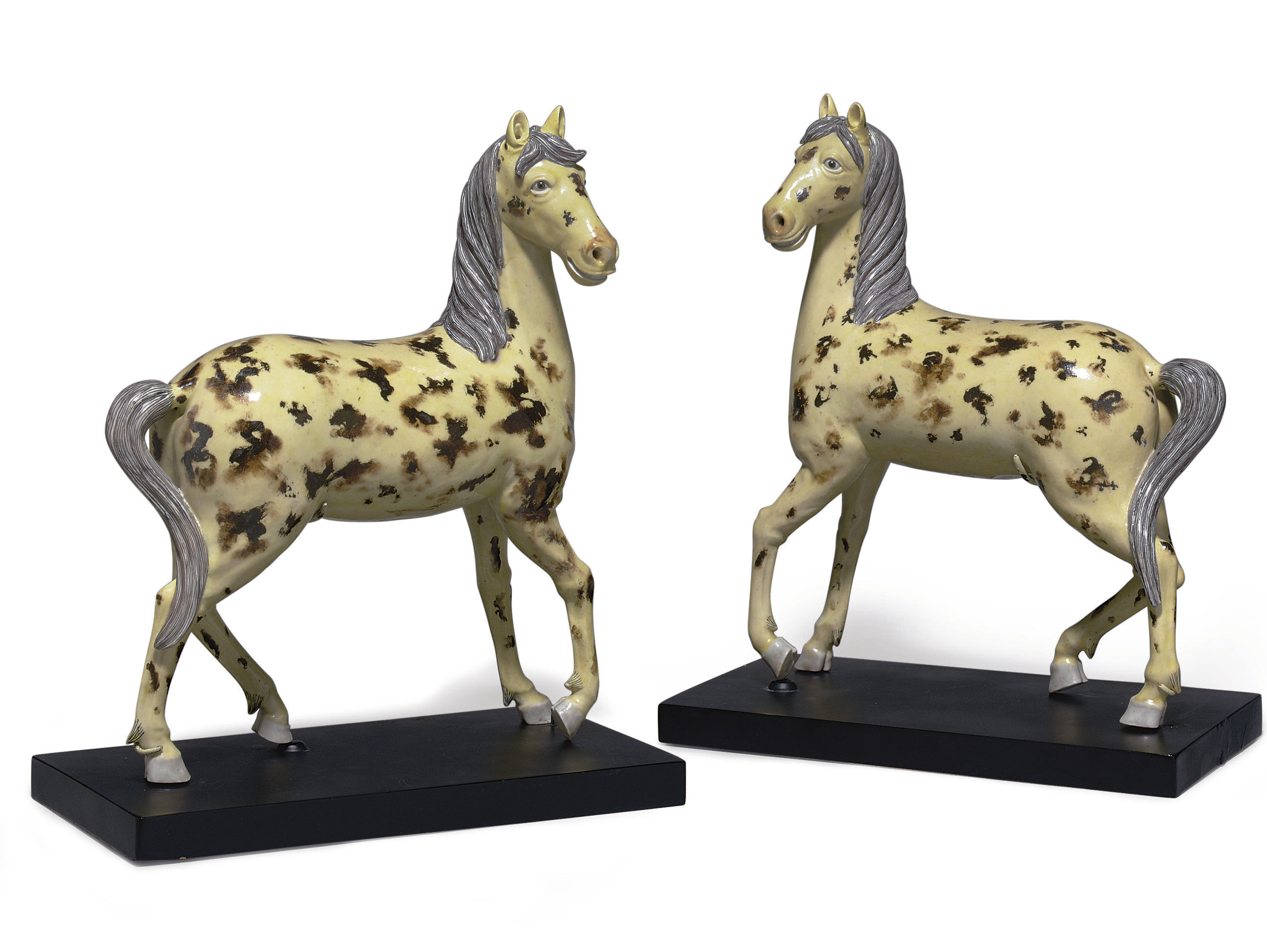 A VERY RARE PAIR OF BISCUITGLAZED HORSES , LATE 18TH/EARLY 19TH