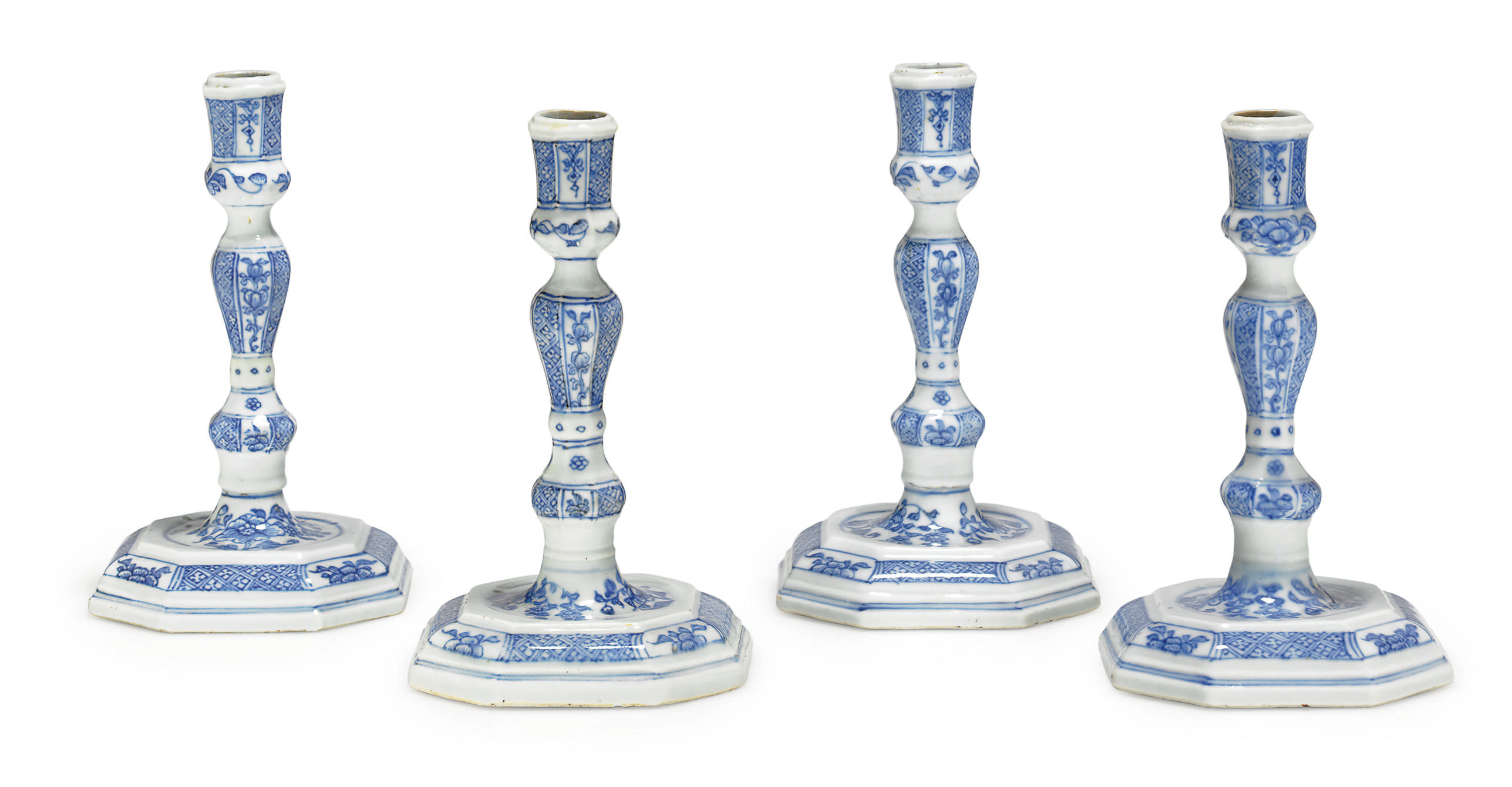 A SET OF FOUR BLUE AND WHITE CANDLESTICKS , CIRCA 1740 Christie's