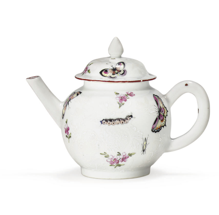 A LONDONDECORATED TEAPOT AND COVER