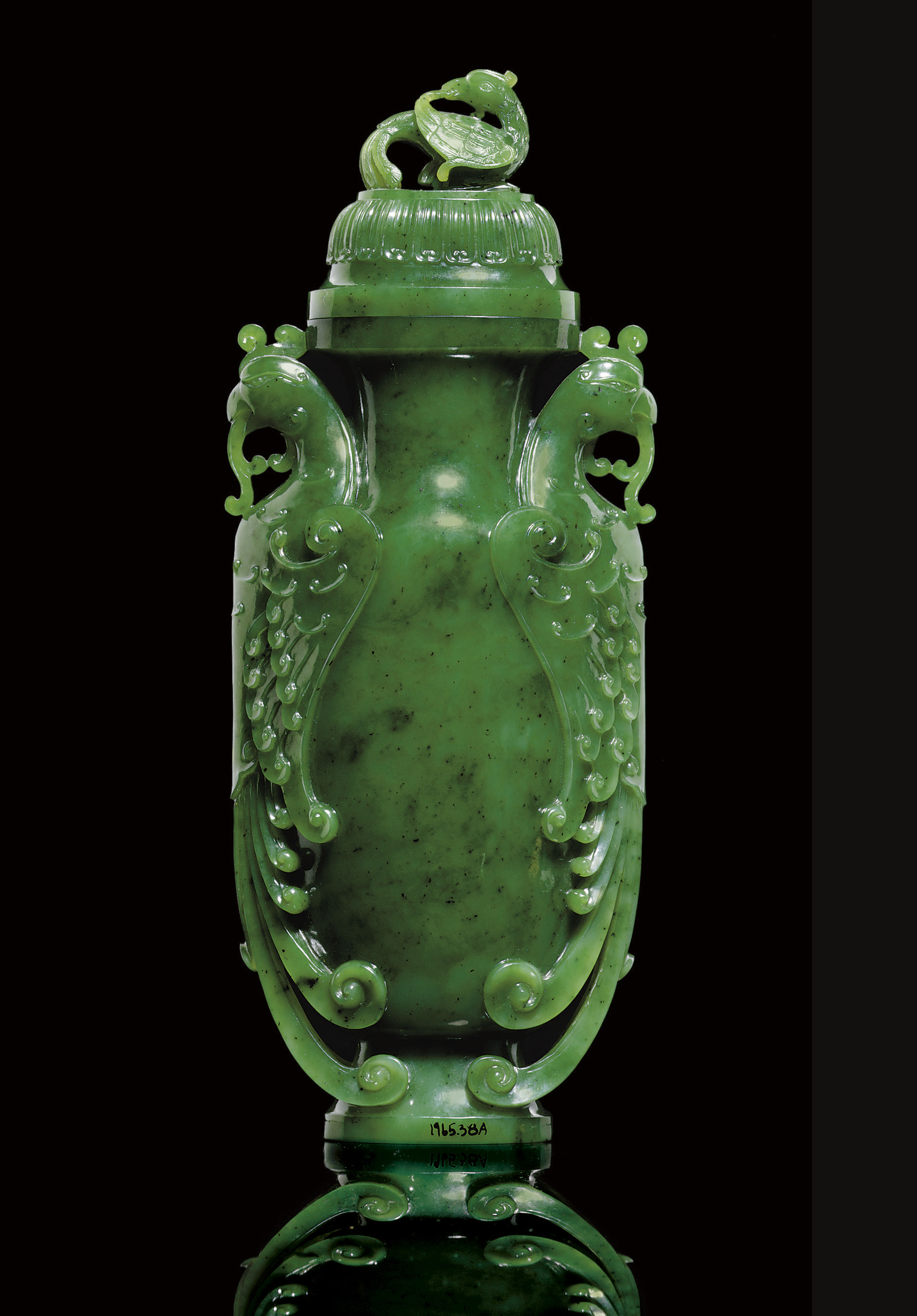 A BRILLIANT GREEN JADE VASE AND COVER Christie's