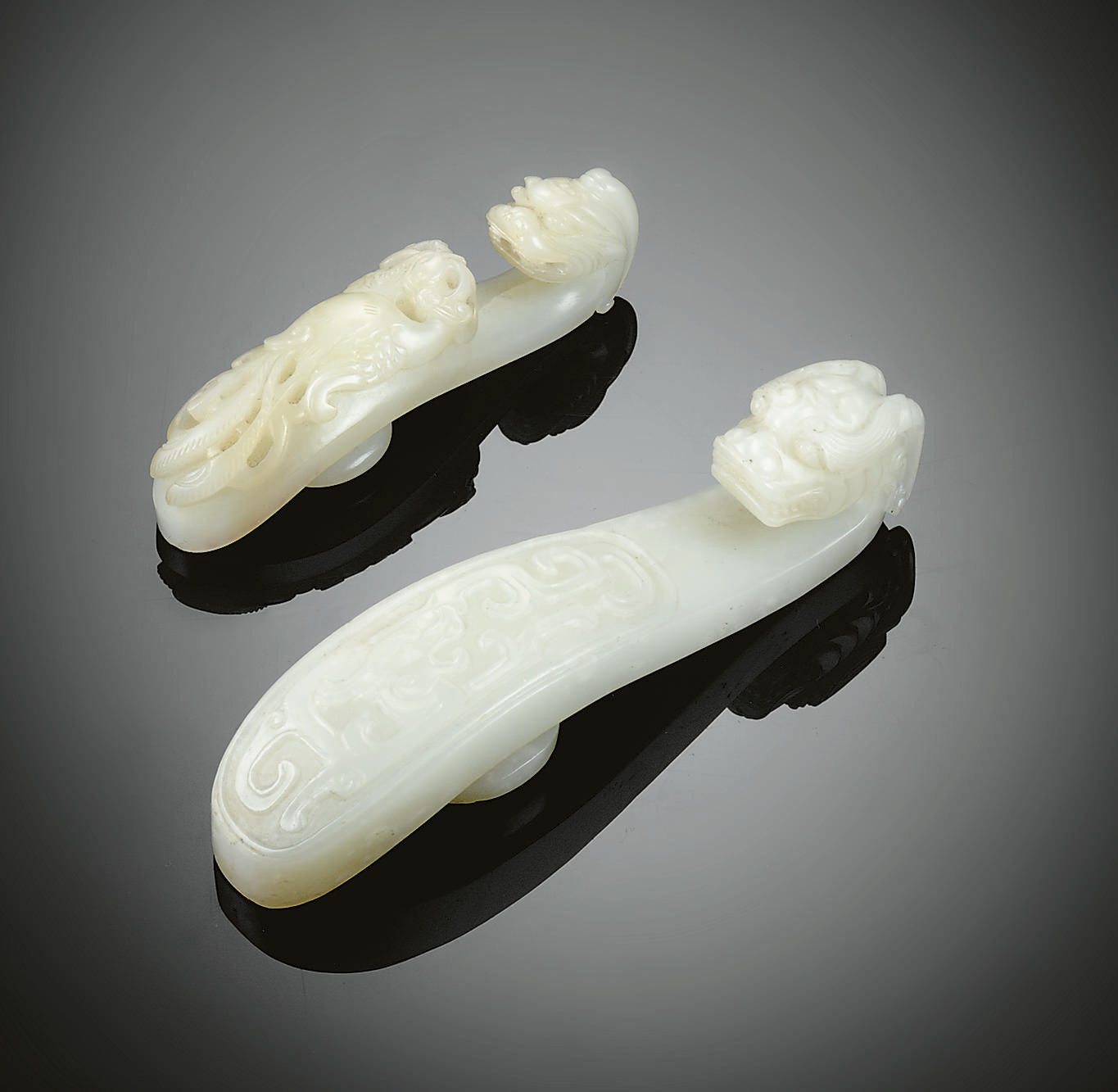TWO WHITE JADE BELT HOOKS , 18TH CENTURY Christie's