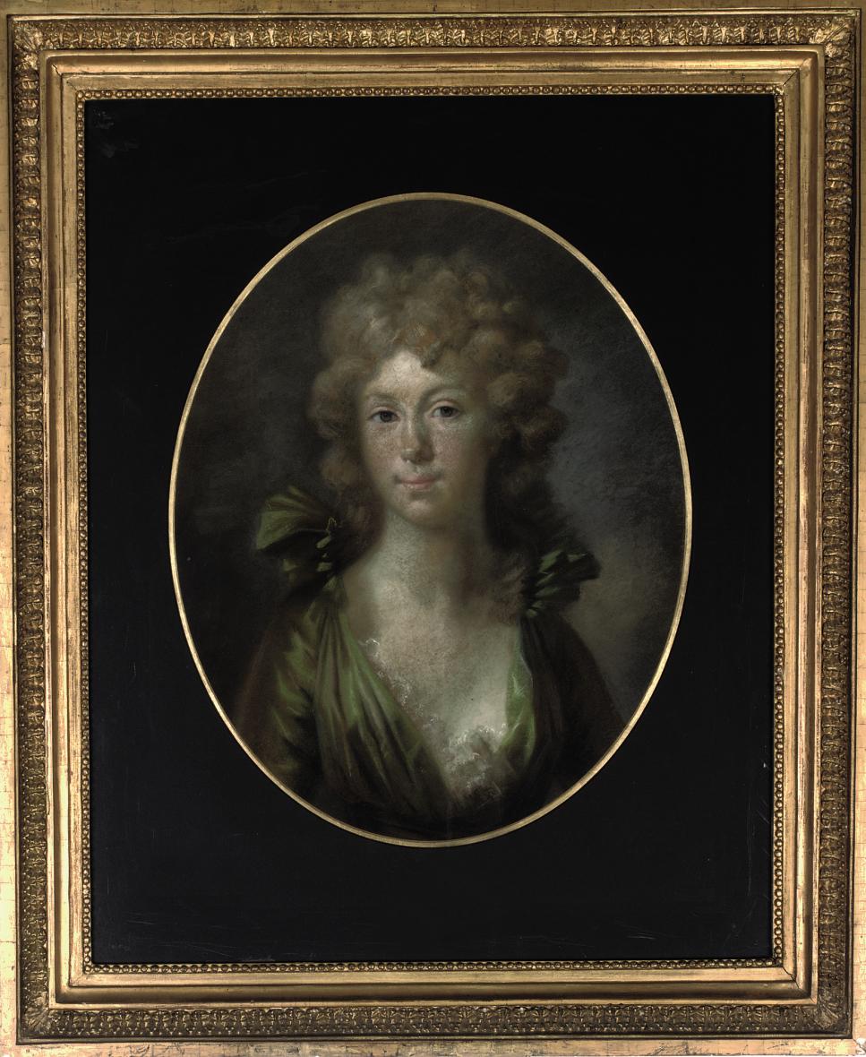 Portrait of an elegant lady, bust-length, in a green dress 
