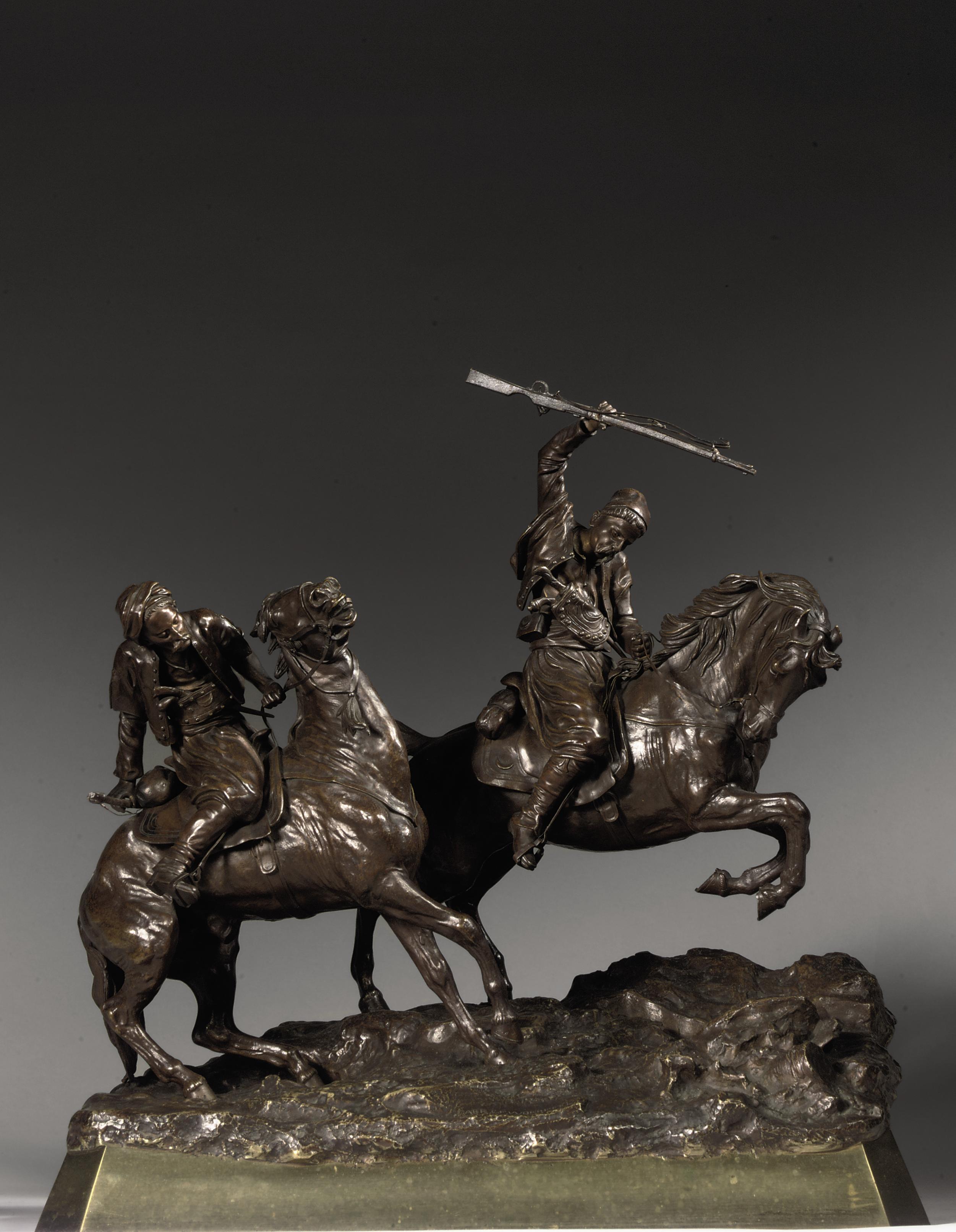 A RUSSIAN EQUESTRIAN BRONZE GROUP OF TWO COSSACK HORSEMEN
