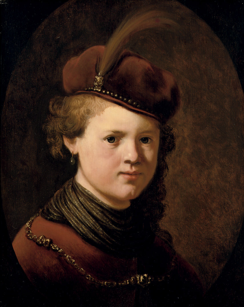 A boy in an oriental costume 
