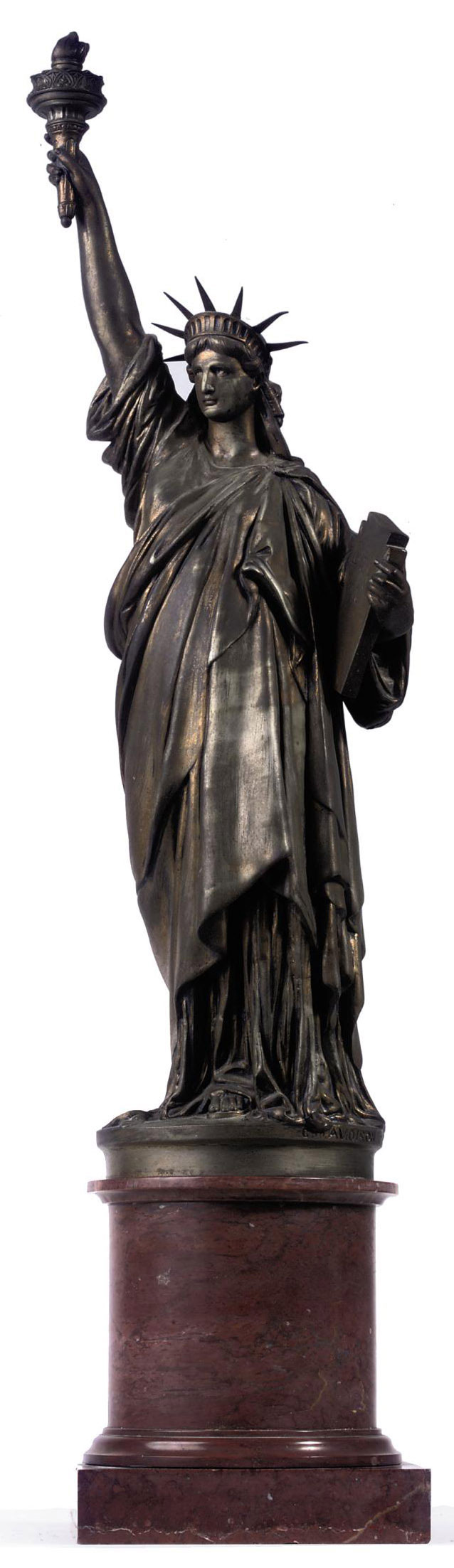 A FRENCH GILTPATINATED ZINC FIGURE ENTITLED 'LA LIBERTE ECLAIRANT LE