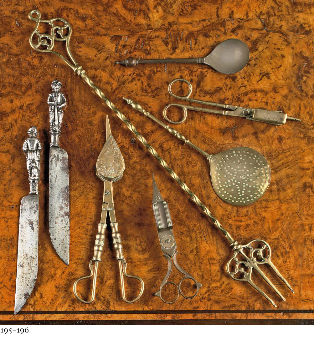 A GERMAN BRASS CANDLESNUFFER , NUREMBERG, 16TH CENTURY, MARKED