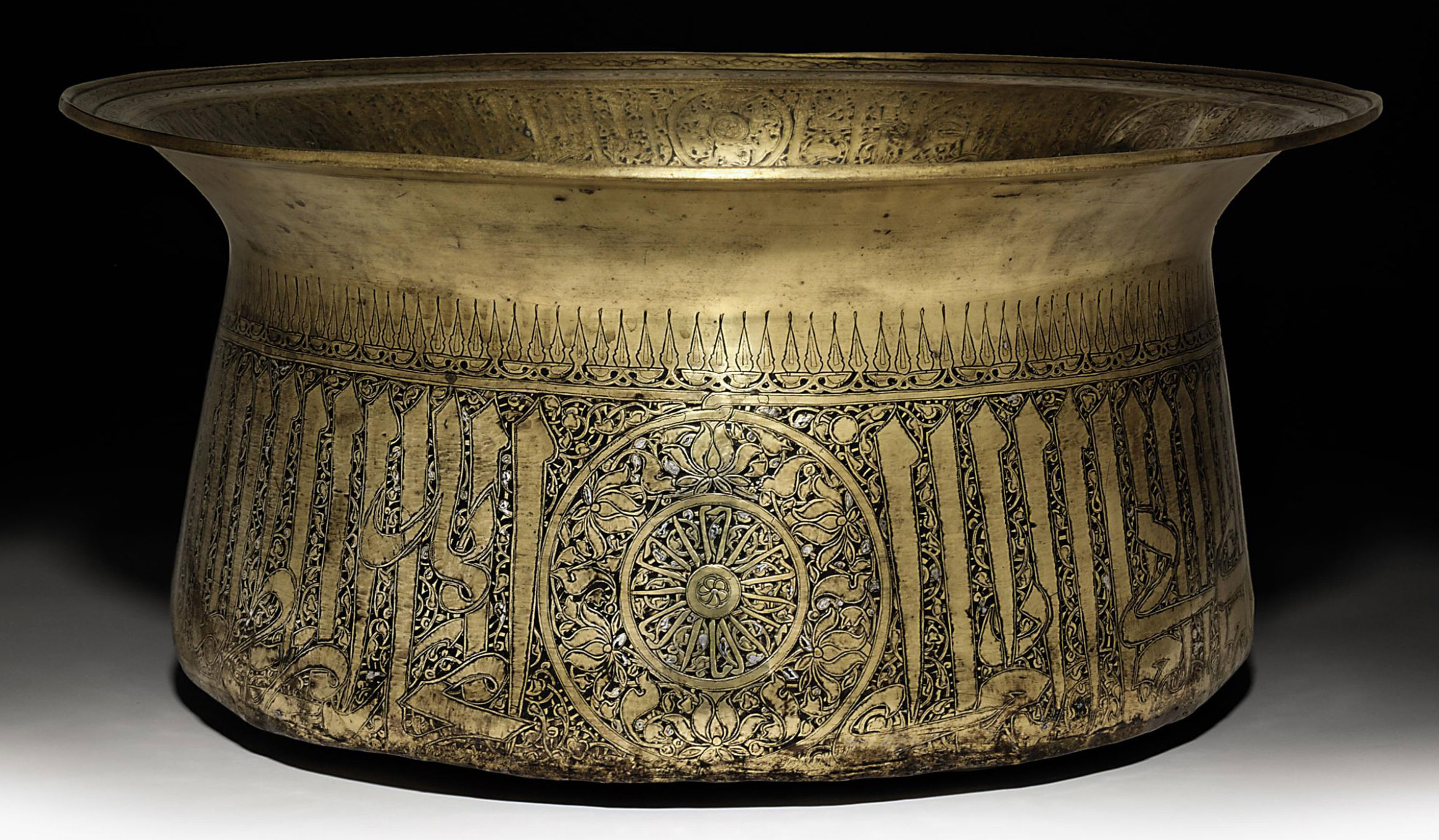 A LARGE MAMLUK SILVERINLAID BRASS BASIN , EGYPT, ALNASIR MUHAMMAD
