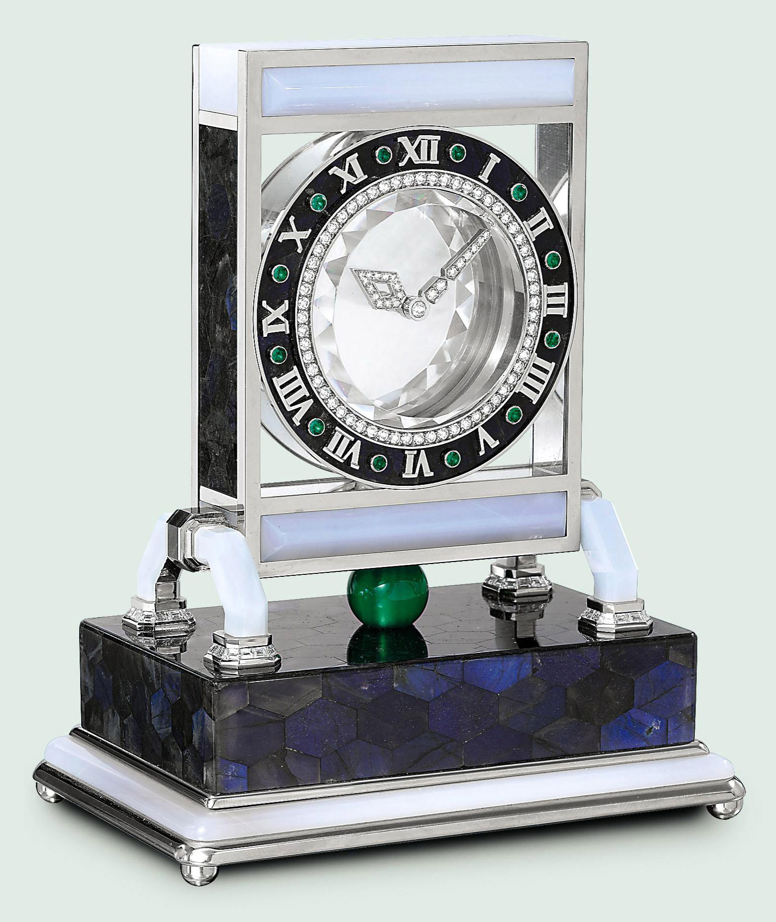A ROCK CRYSTAL, DIAMOND AND MULTIGEM 'MYSTERY' CLOCK, BY CARTIER