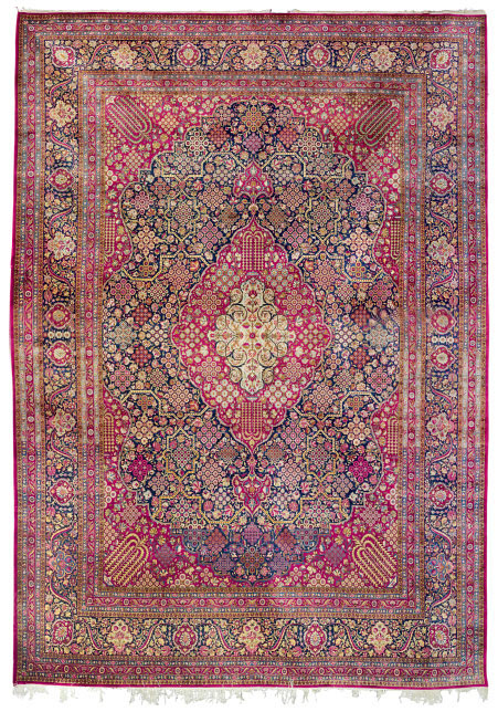 A SILK KASHAN CARPET