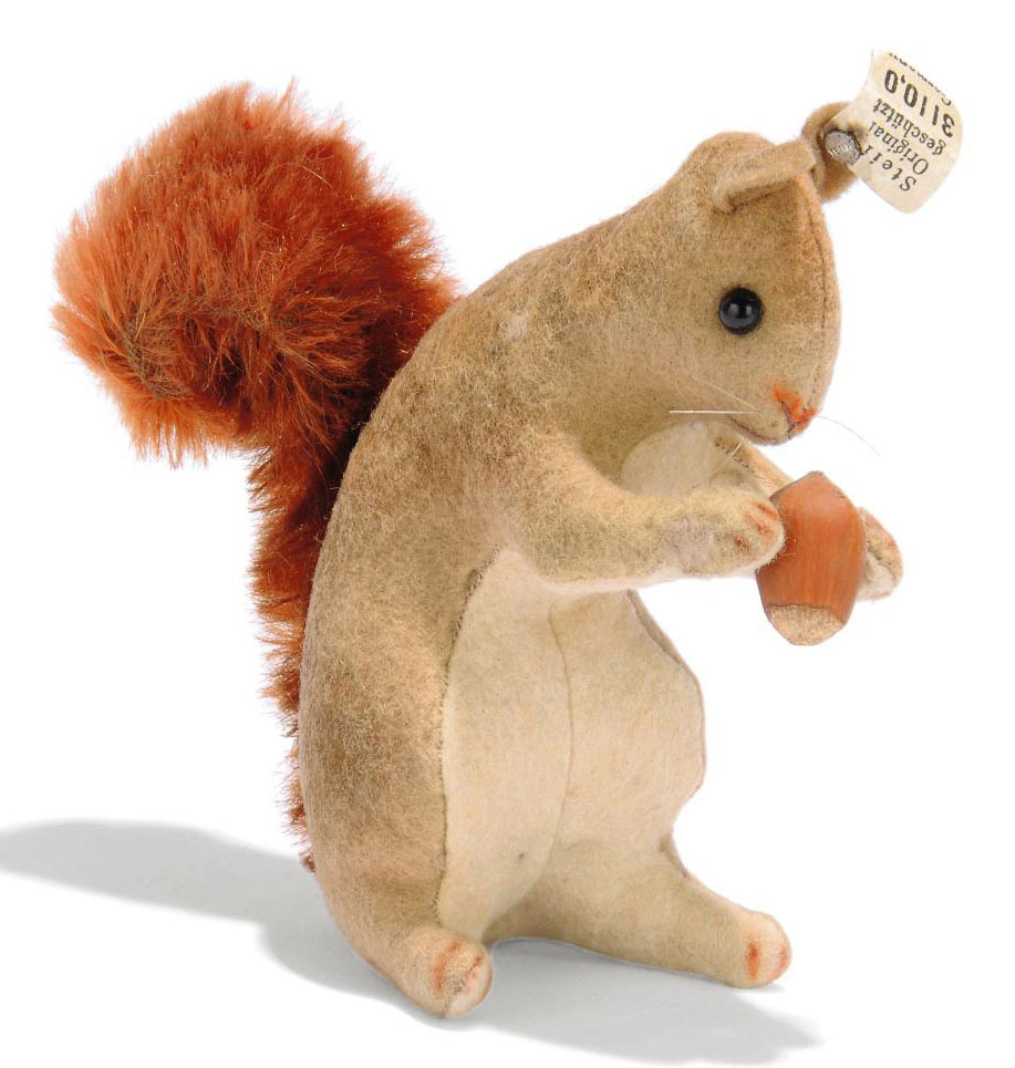 A STEIFF FELT SQUIRREL, (3110,0), brown and white, black ...